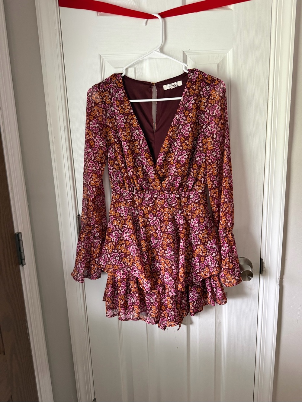 Blush Floral Wrap Romper in Burgundy, Pink, and Mustard